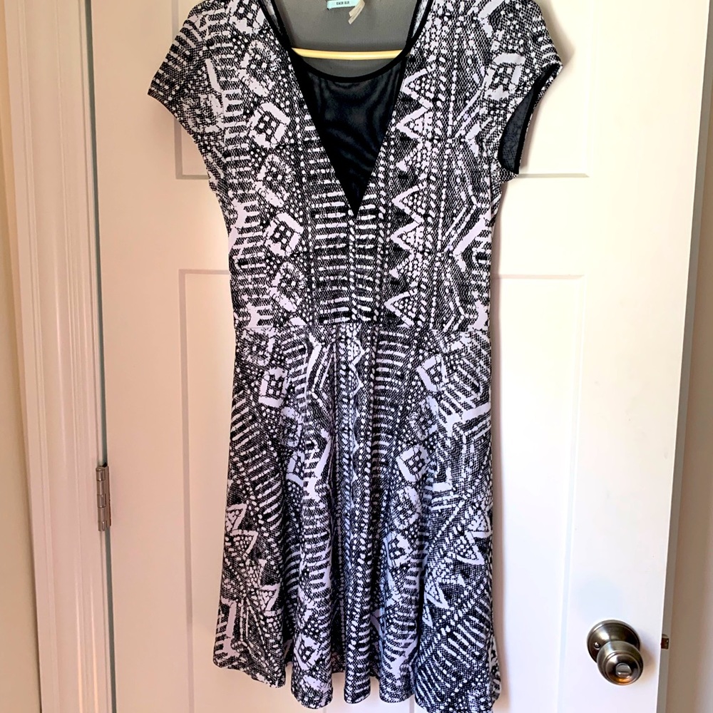 Gorgeous dress w/ mesh paneling